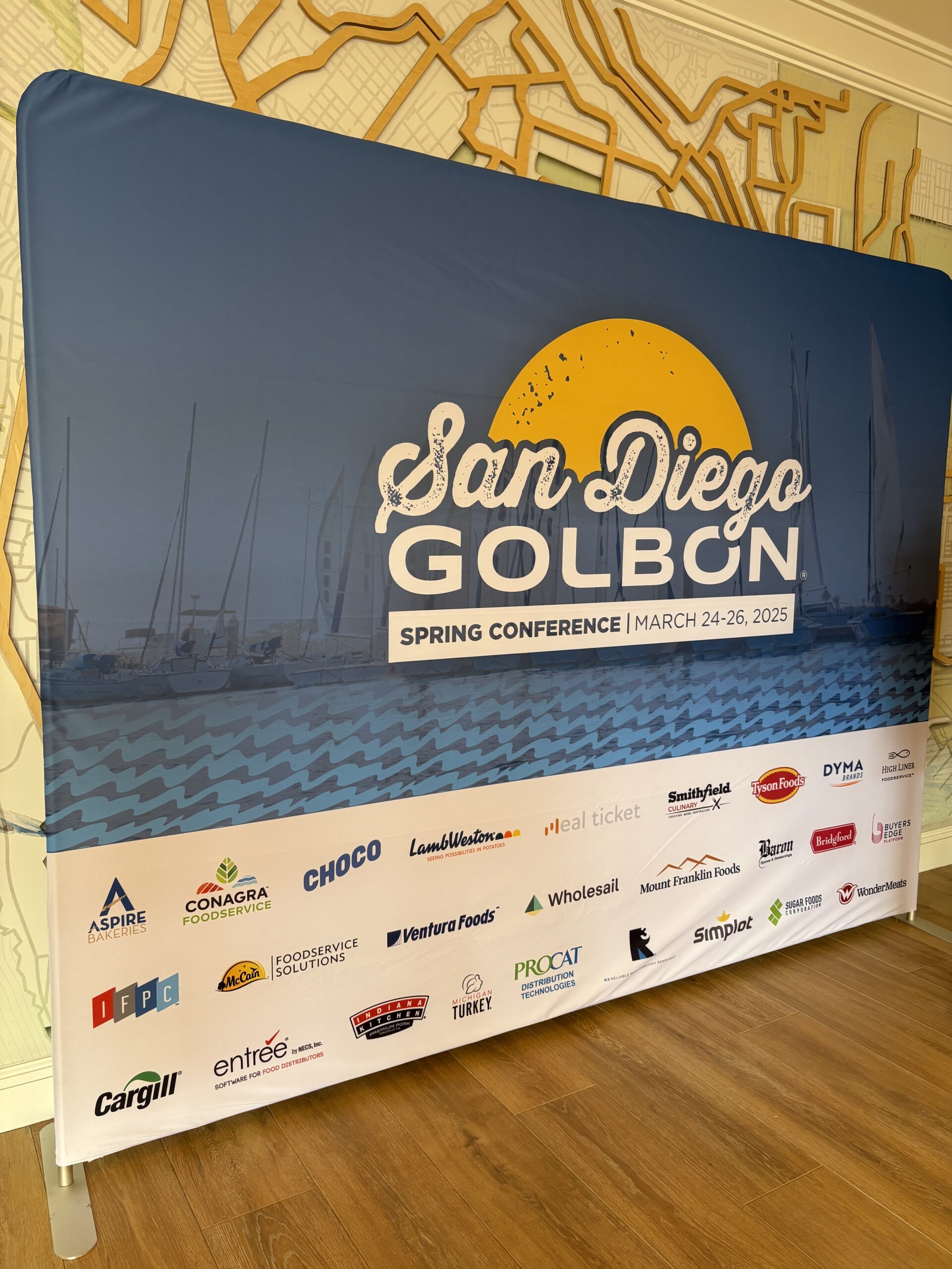 Sign showing the ProCat logo as a conference sponsor